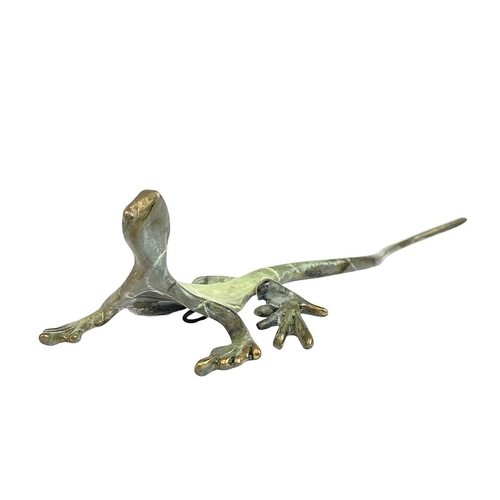 173 - A Michael Storey bronze of a lizard or Gekko. Length 18cm.