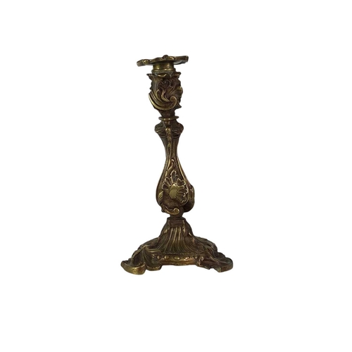 18 - A pair of French rococo style brass candlesticks. 19th century, with typical leaf and scroll casting... 