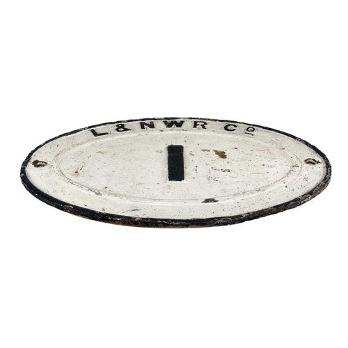 181 - An oval cast iron L&NWR railway bridge plate. Number 1, 30X45cm.