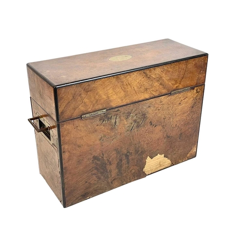 2 - A Victorian figured walnut campaign style tantalus. With folding brass side handles and fitted with ... 