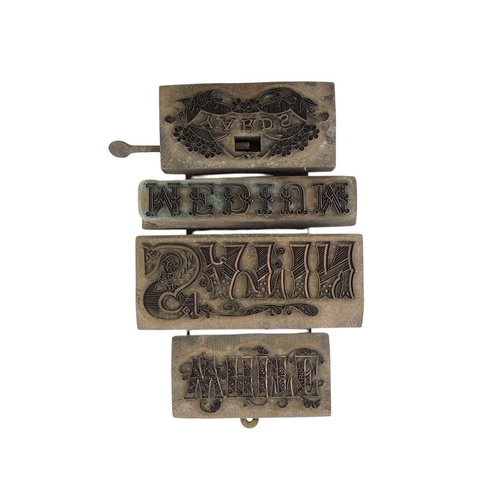 21 - Textile printing blocks. The copper alloy decorative script reads White Satin Medium Yards, 33cm x 2... 