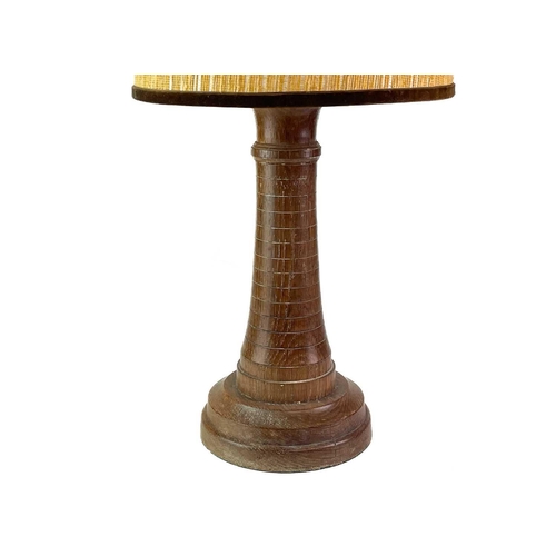 228 - A teak lighthouse table lamp probably from the timbers of HMS Warspite. Height 31cm.