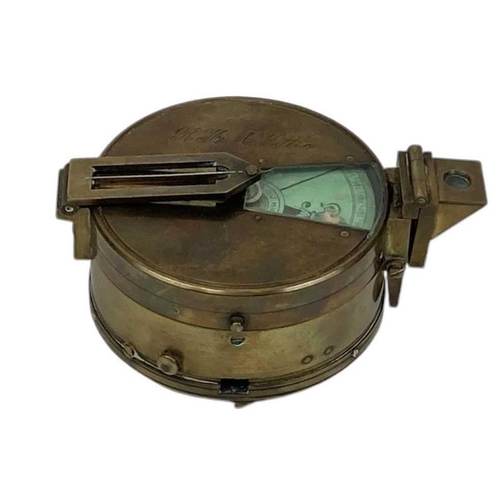 238 - An early 20th century Swiss compass/sitometer. In original leather case together with a brass Watkin... 