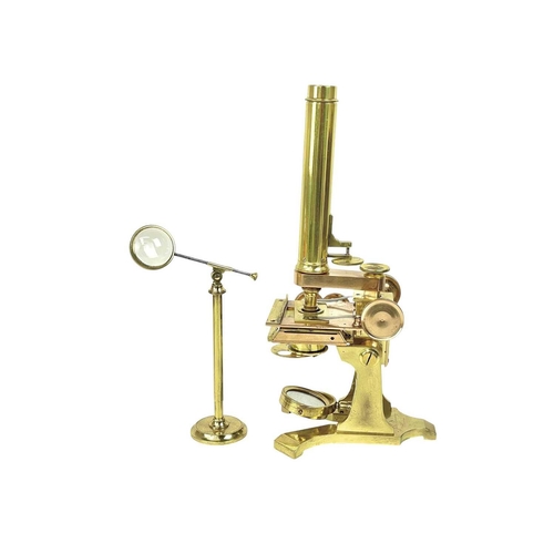 242 - A Victorian brass compound microscope by John Browning. Circa 1870, in a mahogany case with addition... 