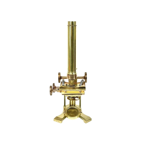 242 - A Victorian brass compound microscope by John Browning. Circa 1870, in a mahogany case with addition... 