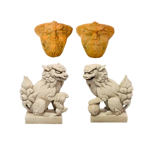 29 - A pair of reconstituted stone dogs of Fo. Height 29cm, together with two terracotta planters, moulde... 