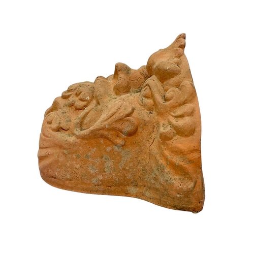 29 - A pair of reconstituted stone dogs of Fo. Height 29cm, together with two terracotta planters, moulde... 