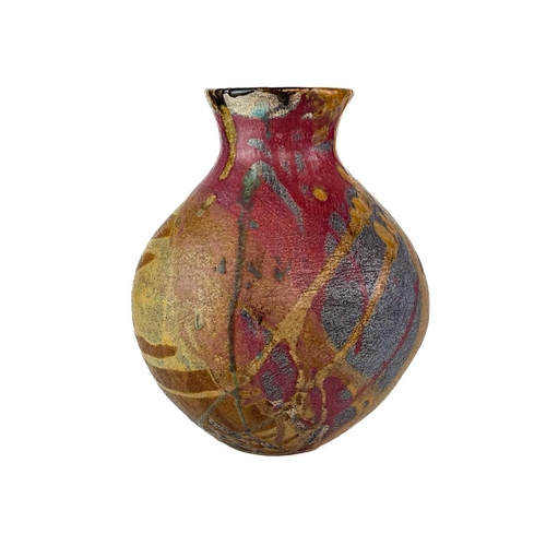 297 - A studio pottery raku fired vase. Signed Jane Bideford 2003, height 29cm together with another raku ... 