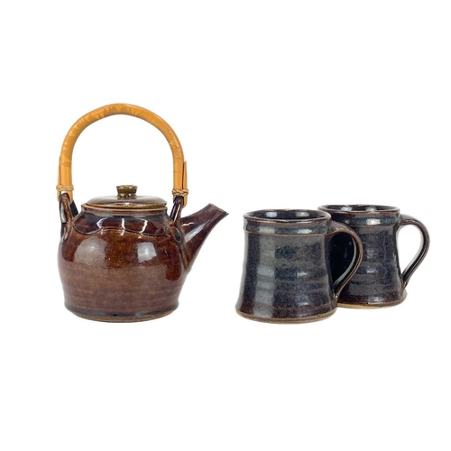 309 - Scott Marshall (1936-2008) Boscean Pottery, a large stoneware jug, another smaller jug, two mugs, a ... 