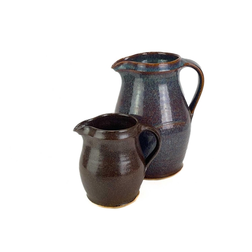 309 - Scott Marshall (1936-2008) Boscean Pottery, a large stoneware jug, another smaller jug, two mugs, a ... 