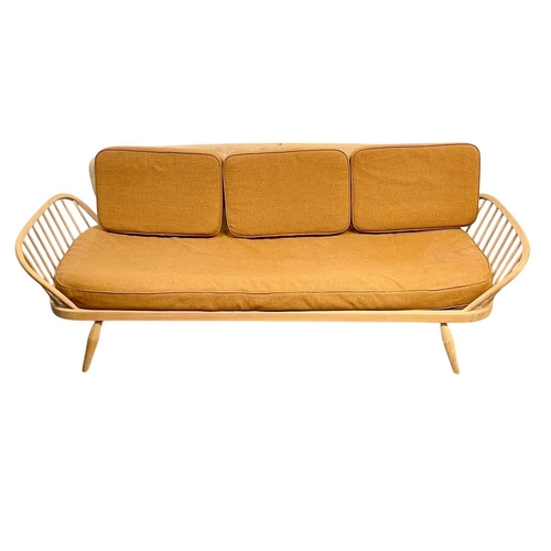 327 - An Ercol blond beech and elm studio couch or day bed. Model number 355, height 77cm, width 206cm, de... 