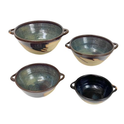 342 - Scott Marshall (1936-2008) Boscean Pottery, three graduating twin handled bowls, largest diameter 29... 