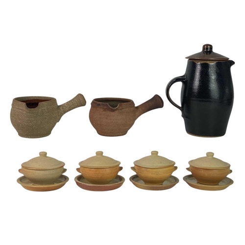 409 - A collection of seven Leach Standard Ware pieces. Including four lidded dishes, one coffee pot and t... 