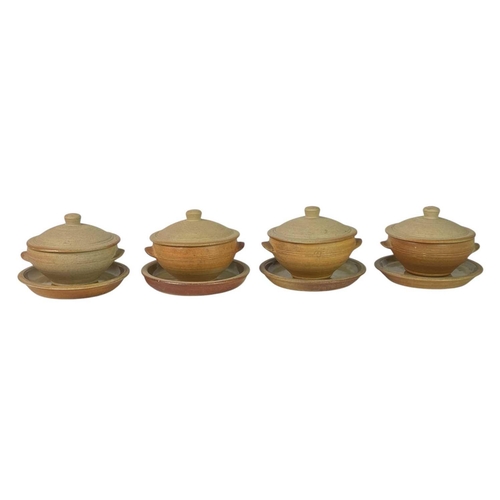 409 - A collection of seven Leach Standard Ware pieces. Including four lidded dishes, one coffee pot and t... 