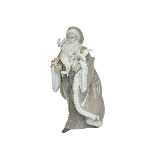 418 - A Lladro porcelain Spirt of Nature Santa Claus figure. Limited edition in original box.