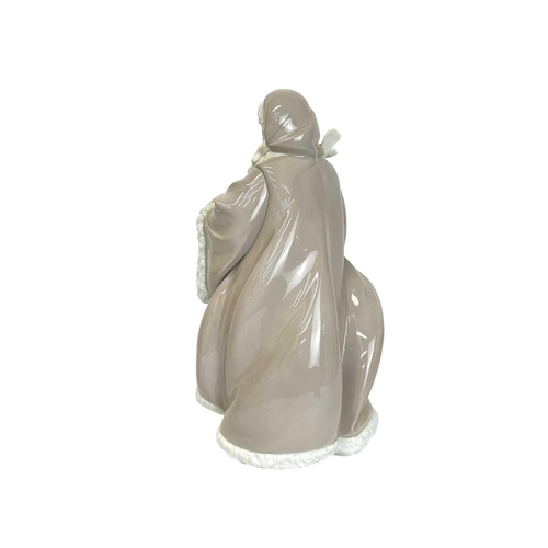 418 - A Lladro porcelain Spirt of Nature Santa Claus figure. Limited edition in original box.