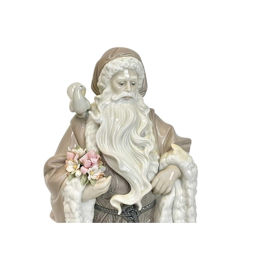 418 - A Lladro porcelain Spirt of Nature Santa Claus figure. Limited edition in original box.