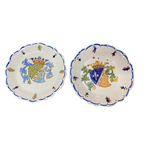 419 - A set of eight French faience armorial plates. 20th century, with painted decoration, diameter 25cm.