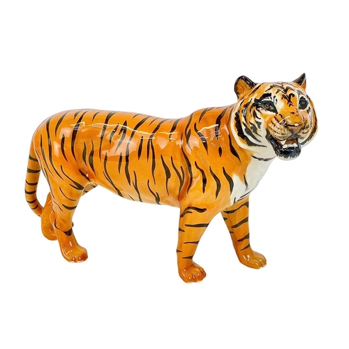 429 - A Beswick figure of a tiger. Length 29cm.