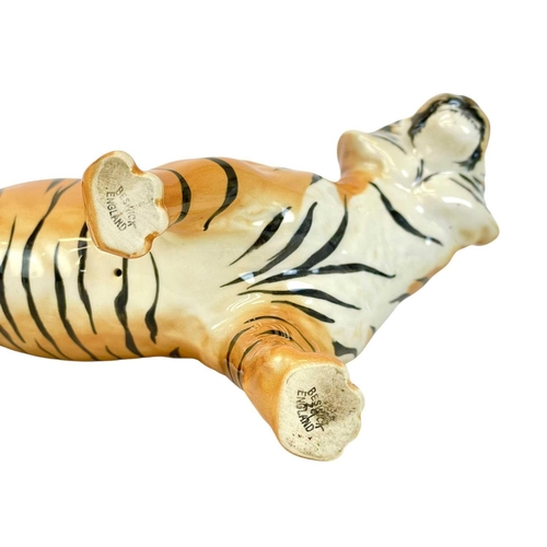 429 - A Beswick figure of a tiger. Length 29cm.