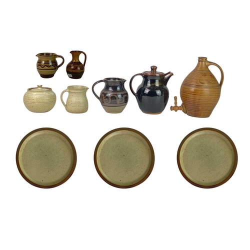 433 - A collection of Winchcombe Pottery Ten pieces in total. Four jugs, a coffee pot, suger jar, three pl... 