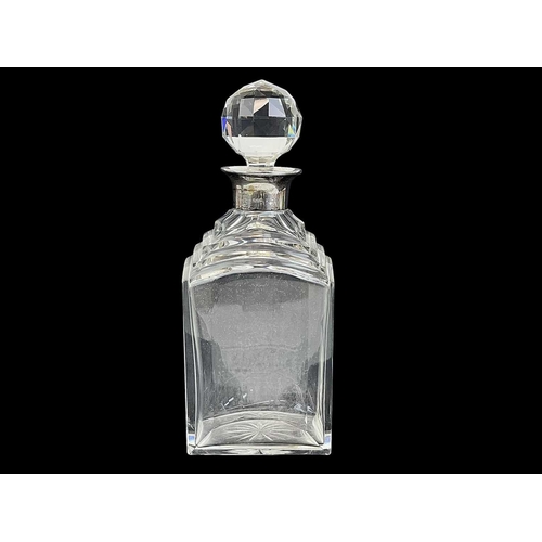 471 - An Art Deco cut glass and silver mounted decanter and stopper. With a stepped shoulder, Birmingham, ... 