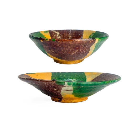 495 - An Afghan pottery dish. With green and umber glaze diameter 26cm together with a matching bowl. (2)