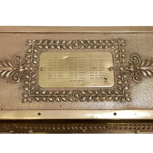 50 - A polished brass National cash register. Circa 1900, with ornate cast and pierced decoration, with c... 