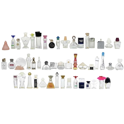 6 - A large collection of miniature scent bottles. In excess of 100 bottles.