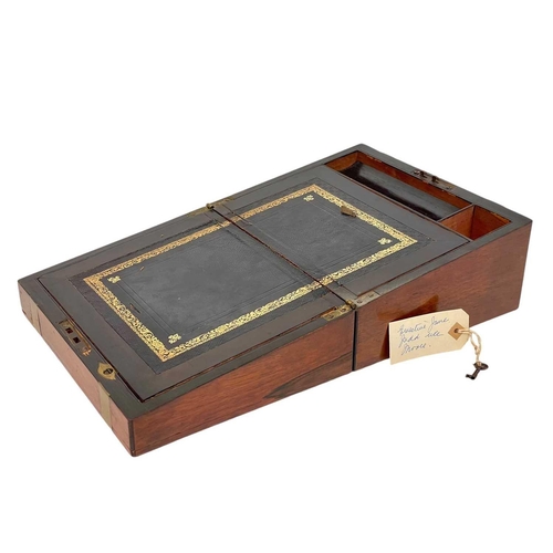 63 - A 19th century walnut and brass bound writing box. Height 13cm width 26cm depth 21cm.