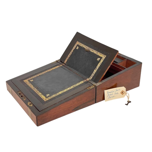 63 - A 19th century walnut and brass bound writing box. Height 13cm width 26cm depth 21cm.