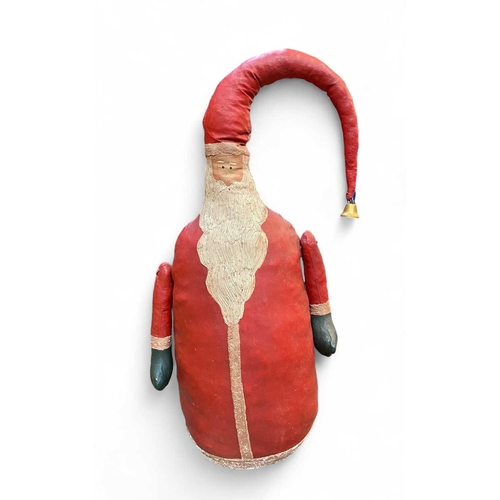 64 - A large primitive Santa door stop. Painted canvas, height 67cm.