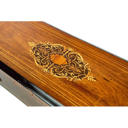 77 - A 19th century rosewood marquetry musical box by Nicole Freres Geneve. Playing eight Airs, listed on... 