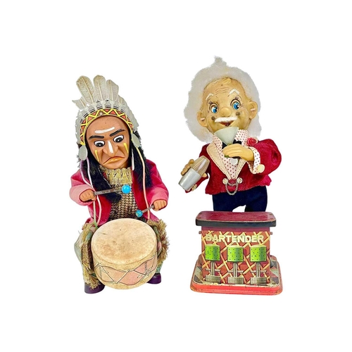 88 - Two Japanese tinplate and celluloid automaton. 'Bartender' and Native American drummer, the latter m... 