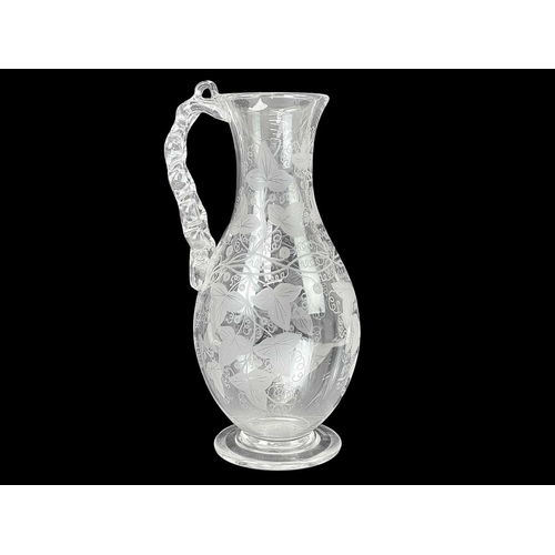 90 - A large glass trumpet vase. Mounted on a stepped oak square base, height 76cm together with a bisque... 