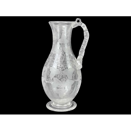 90 - A large glass trumpet vase. Mounted on a stepped oak square base, height 76cm together with a bisque... 