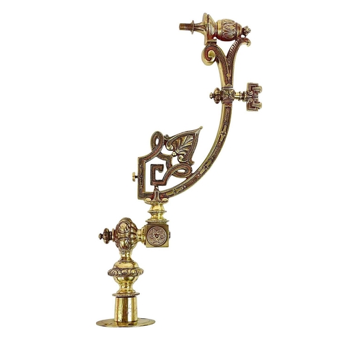 95 - A Victorian ornate cast brass gas lamp bracket. Length 50cm.