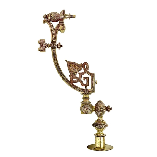 95 - A Victorian ornate cast brass gas lamp bracket. Length 50cm.