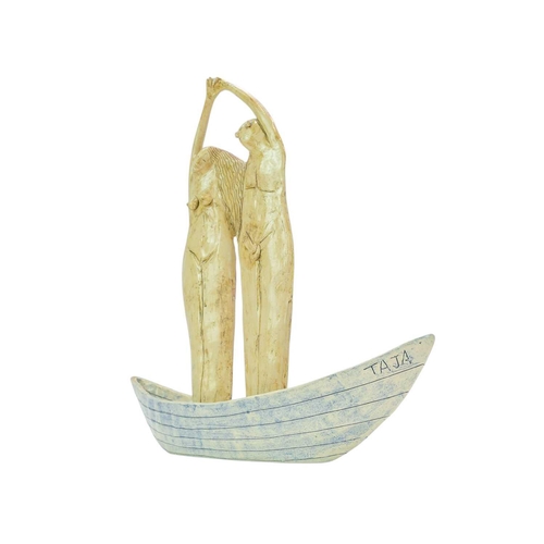 1053 - § Taja Lovers Standing in a Boat Porcelain, signed, height 43cm.