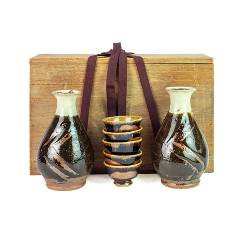 1061 - § Shoji HAMADA (1894-1978) Sake Set Stoneware, comprising of two sake bottles, height 14cm, and five... 