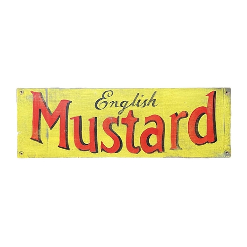 131 - A handpainted 'English Mustard' sign. Painted onto a plywood board, width 78cm, height 20cm, depth 1... 