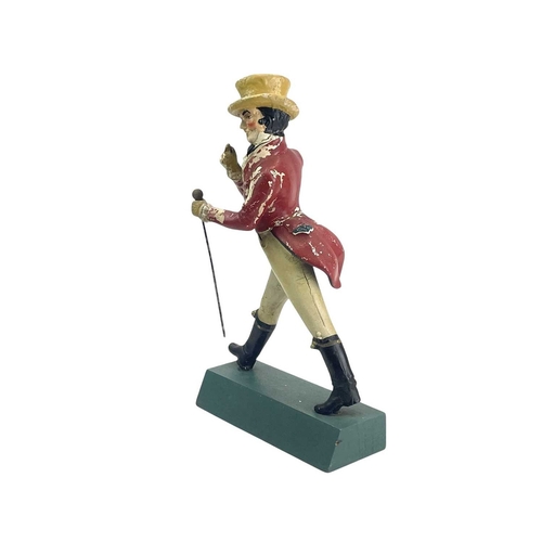 132 - A Johnny Walker advertisement figure. Composition on a painted beech base, height 39cm.