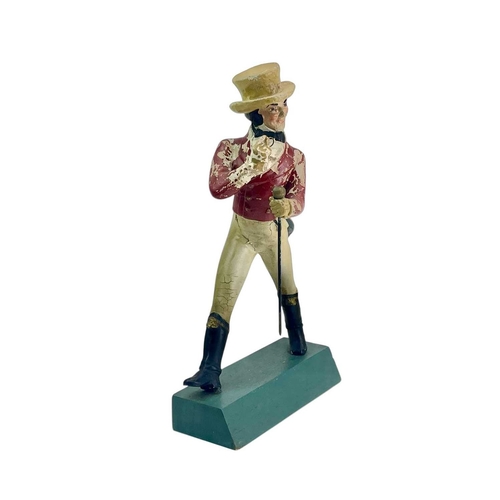 132 - A Johnny Walker advertisement figure. Composition on a painted beech base, height 39cm.