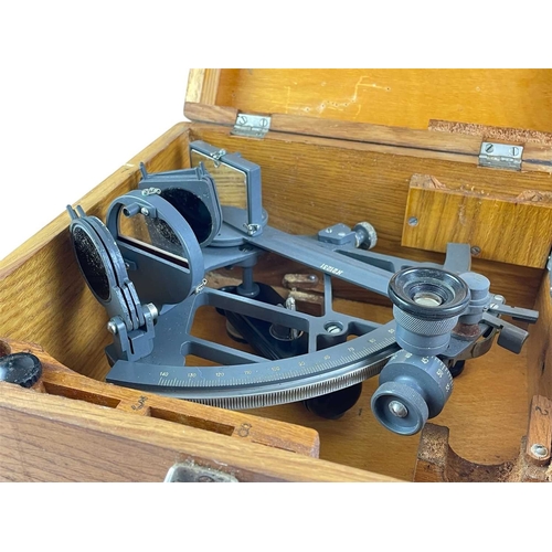 150 - A Russian grey painted metal sextant. Number 21231, in an oak case, width 28cm.