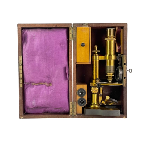 156 - A French lacquered brass microscope by Nachet et Fils, Paris. Circa 1860, inscribed to the lead fill... 