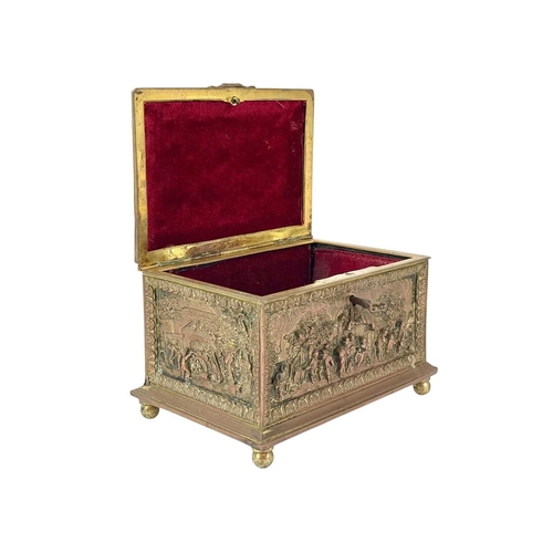 17 - A French electrotype type gilt metal casket. Circa 1860, the cover and sides relief decorated with T... 