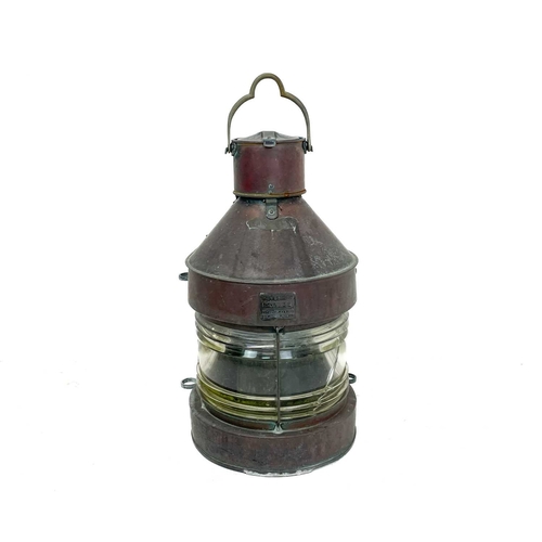 171 - A Meteorite ship's copper masthead navigation lamp. Numbered A19032, height 58cm.