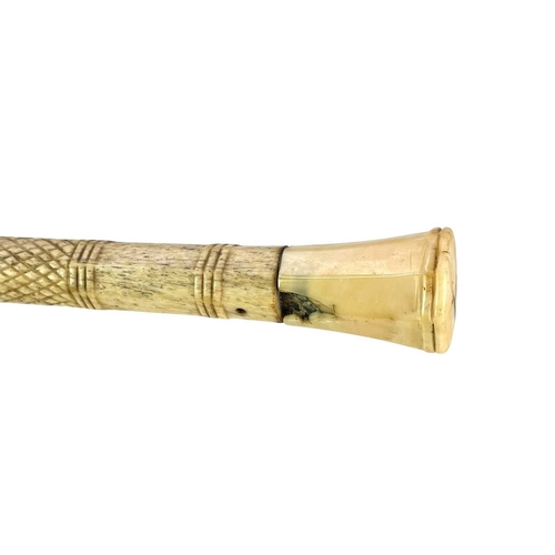 178 - A spiral turned whalebone cane. 19th century, length 82.5cm.