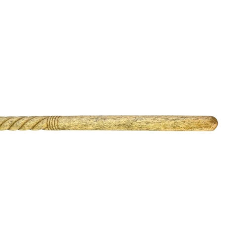 178 - A spiral turned whalebone cane. 19th century, length 82.5cm.