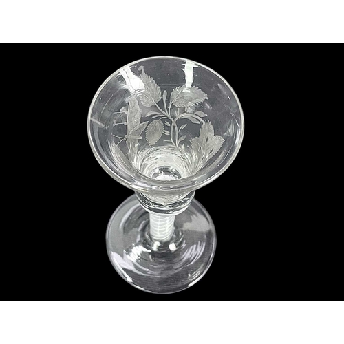 190 - A George III wine glass. The bell bowl engraved with a butterfly, flowers and foliage, on an opaque ... 